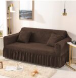 Dark brown Persian style sofa cover with fitted frilled design and stretchable fabric