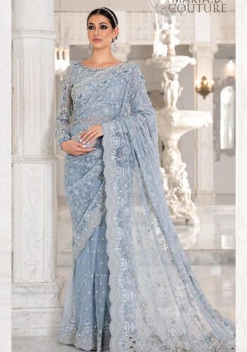 Maria B Sky Blue Color Saree Collection 2025 available at sarastore.pk featuring heavily embroidered net, silk peticoat, and cut-work borders