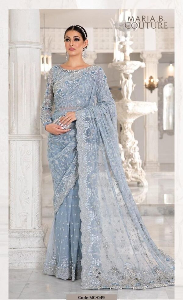 Maria B Sky Blue Color Saree Collection 2025 available at sarastore.pk featuring heavily embroidered net, silk peticoat, and cut-work borders