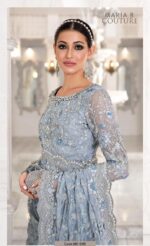 Maria B Sky Blue Color Saree Collection 2025 available at sarastore.pk featuring heavily embroidered net, silk peticoat, and cut-work borders