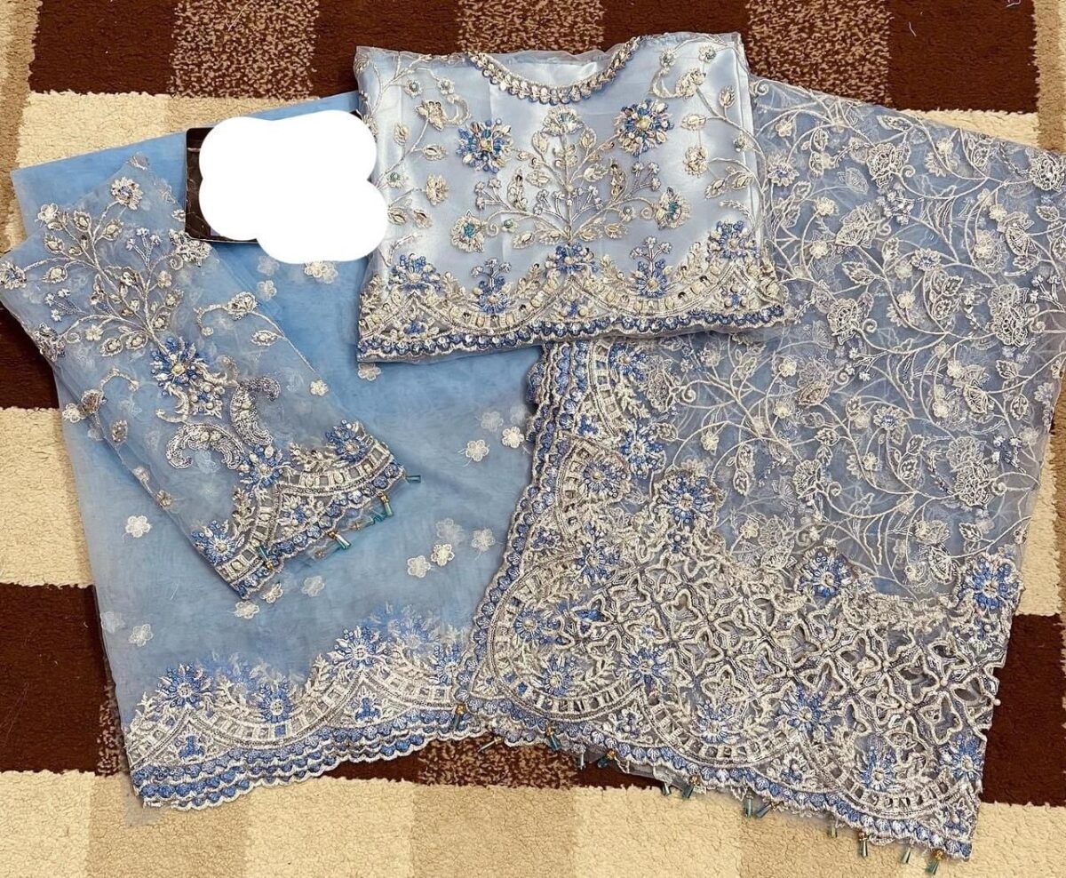 Maria B Sky Blue Color Saree Collection 2025 available at sarastore.pk featuring heavily embroidered net, silk peticoat, and cut-work borders